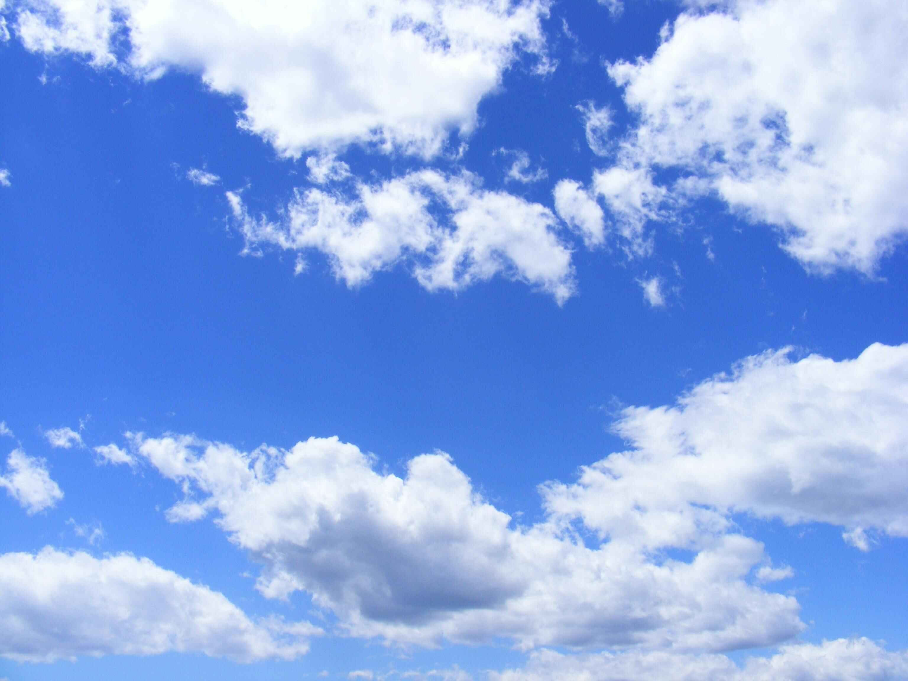 A partly cloudy summer sky