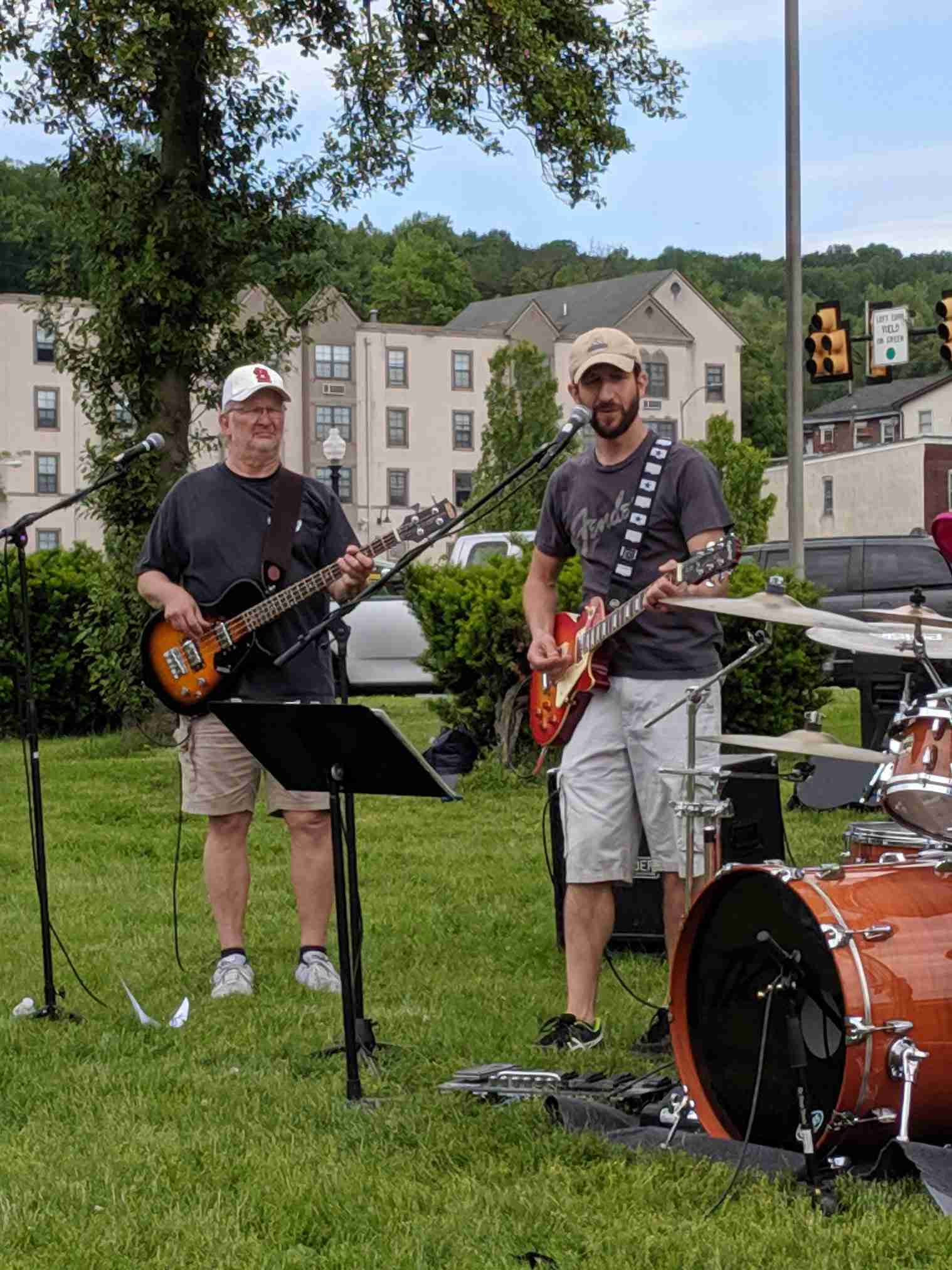 Gary Harmon playing bass and Jon Pacella playing guitar