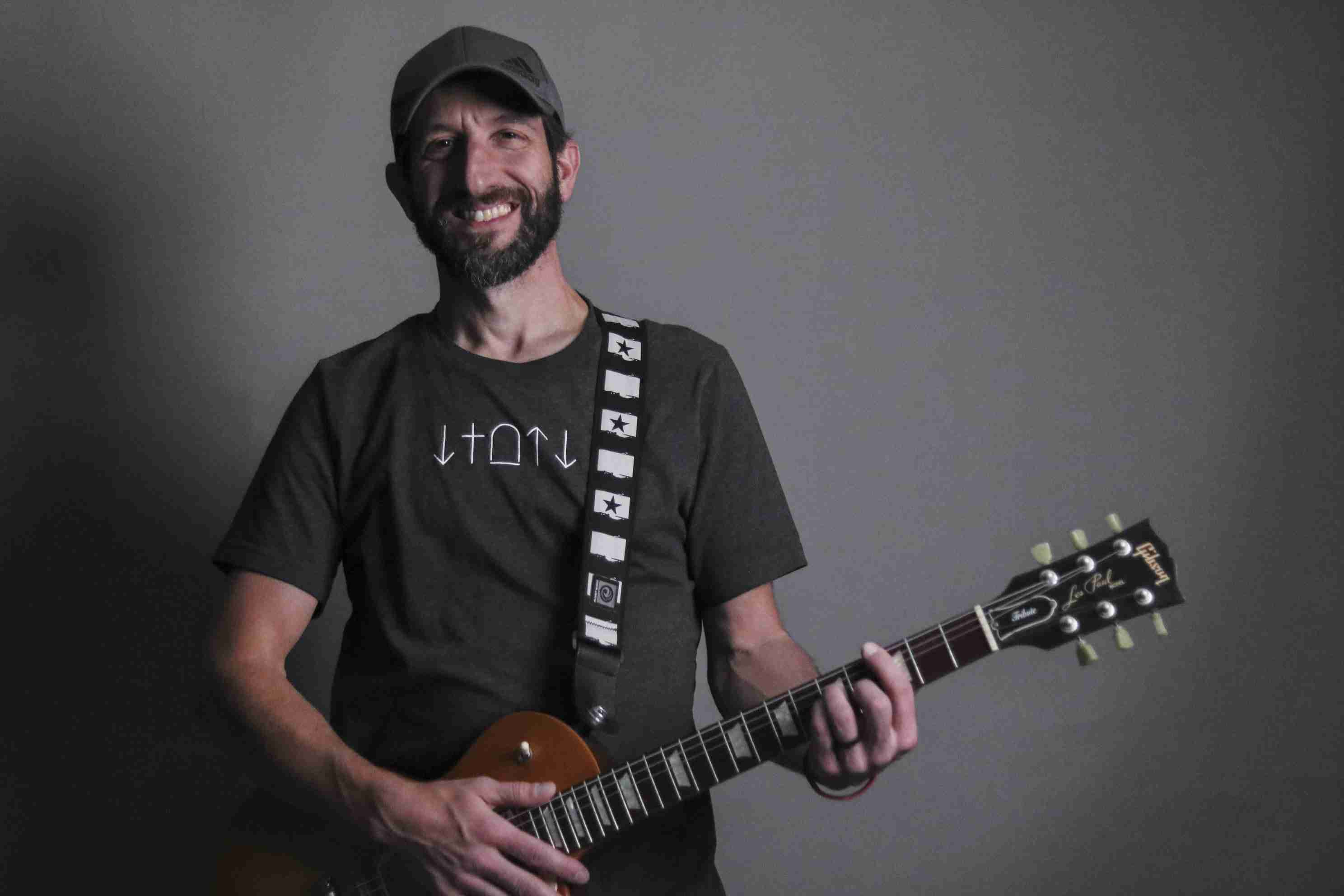Jon Pacella Holding his guitar