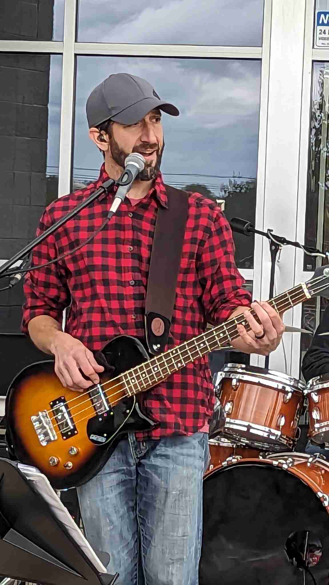 Jon Pacella playing bass and singing
