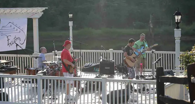 Exit Strategy performing on a waterfront deck