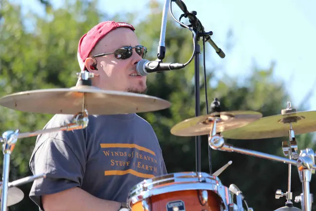 Kyle Herman Playing drums and singing